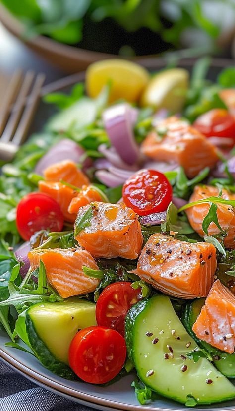 This Fresh and Healthy Salmon Salad Recipe is the perfect meal for anyone looking for a light, nutritious, and satisfying dish. Made with perfectly grilled or baked salmon, fresh greens, and a zesty lemon vinaigrette, this salad is bursting with flavor and packed with omega-3s. Add your favorite vegetables like cucumber, avocado, and cherry tomatoes for extra crunch and color. Cucumber And Salmon Salad, Salmon Salad Recipe, Salmon Salad Recipes, Salmon Spinach, Cucumber Avocado, Healthy Salmon, Seared Salmon, Lemon Vinaigrette, Salmon Salad