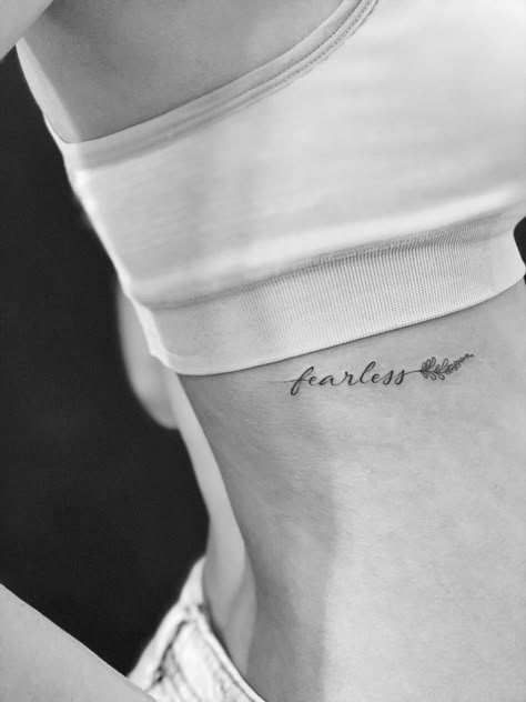 Live Without Regrets Tattoo, Fearless Tattoos For Women, Rib Script Tattoo, Small Ribcage Tattoo, Fearless Tattoos, Worthy Tattoo, Fearless Tattoo, Rib Tattoo Quotes, Small Rib Tattoos