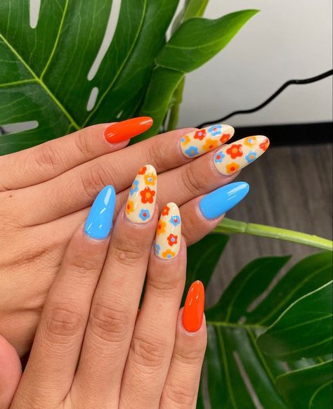 Summer Nails Blue Orange, Bright Nails With Flowers, Orange And Blue Summer Nails, Nails Acrylic Orange And Blue, Pink Orange Blue Nails, Blue And Orange Gel Nails, Blue And Orange Nail Ideas, Orange And Blue Nails Design, Blue Nails With Orange Flowers