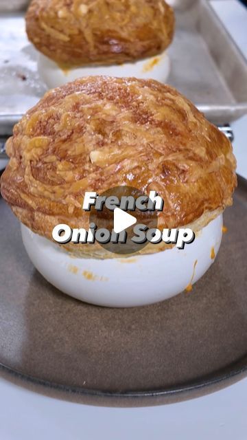 Christopher Kimball’s Milk Street on Instagram: "Is there such a thing as “light” French onion soup? The answer was in an herbaceous, brothy bowl served to @cpkimball at Bichettes (@bichettesrestaurant) in Paris. In place of an impenetrably thick layer of cheese and bread, chef Hortense Thireau topped her soup with a puff pastry lid (elegant, but easy to mimic with pre-packaged dough). And she lightened the soup itself by caramelizing the onions less aggressively, deglazing only once with white wine. Best served straight out the oven, with a crispy, crackly crust.  Get the recipe for French Onion Soup via the link in our profile, under “RECIPES” → @177milkstreet  #milkstreetrecipes #souprecipes #soup #easyrecipes #recipeoftheday #frenchonionsoup #paris" Milk Street French Onion Soup, Recipe For French Onion Soup, Soup With Puff Pastry Top, French Onion Soup With Puff Pastry, French Onion Soup Puff Pastry, Puff Pastry Soup, Milk Street Recipes Christopher Kimball, Cheese And Bread, Puff Pastry Crust