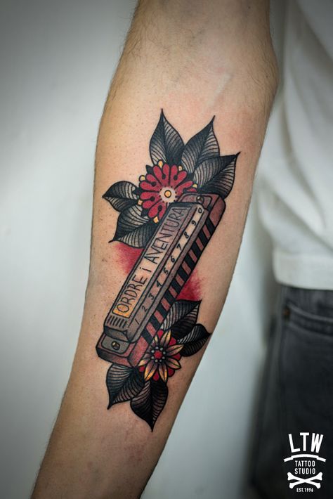 LTW Tattoo and Piercing Barcelona desde 1996LTW Tattoo & Piercing Barcelona Harmonica Tattoo Ideas, Harmonica Tattoo, Trumpet Tattoo, Piano Tattoo, Western Tattoos, Traditional Tattoo Sleeve, Tattoo Prices, Nautical Tattoo, Traditional Tattoo Art