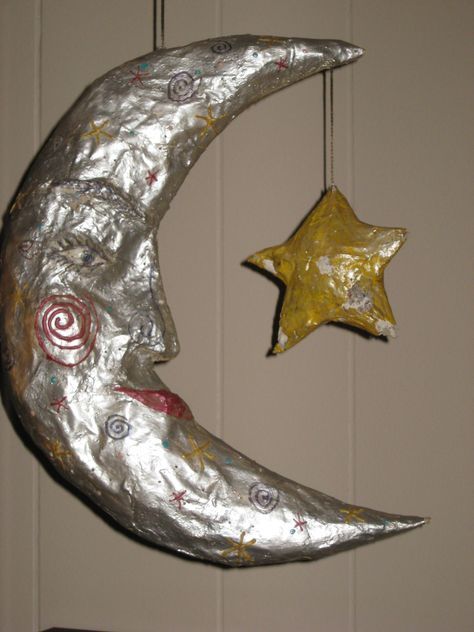 Paper mache moon that my youngest daughter made. Paper Mache Inspiration, Crescent Moon Paper Mache, Paper Mache Person, Sun Paper Mache, Things To Paper Mache, Mexican Paper Mache Folk Art, Paper Mache Aesthetic, Paper Mache Moon Diy, Paper Mache Star