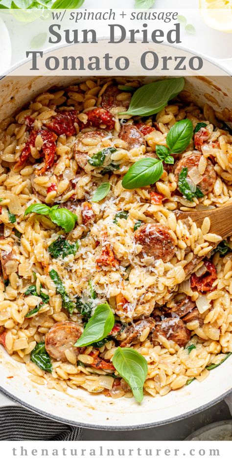 This sun dried tomato orzo has browned chicken sausage coins, baby spinach,   parmesan cheese stirred in & a flavor that will knock your socks off. Orzo With Italian Sausage, Spinach Sun Dried Tomato Orzo, Creamy Sun Dried Tomato Chicken Orzo, Sun Dried Tomato Dinner Recipes, Creamy Sundried Tomato Chicken Orzo, Orzo Sausage Spinach Recipes, Sausage And Orzo Skillet, One Pot Italian Sausage Orzo, Orzo With Chicken Sausage