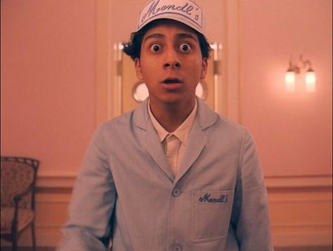 Grand Budapest Hotel | Zero Moustafa Tony Revolori Wes Anderson frame still shot screensaver wallpaper Zero Grand Budapest Hotel, Zero Moustafa, Wes Anderson Characters, Anderson Aesthetic, Tony Revolori, Wes Anderson Aesthetic, Hotel Budapest, Netflix Original Movies, The Grand Budapest Hotel