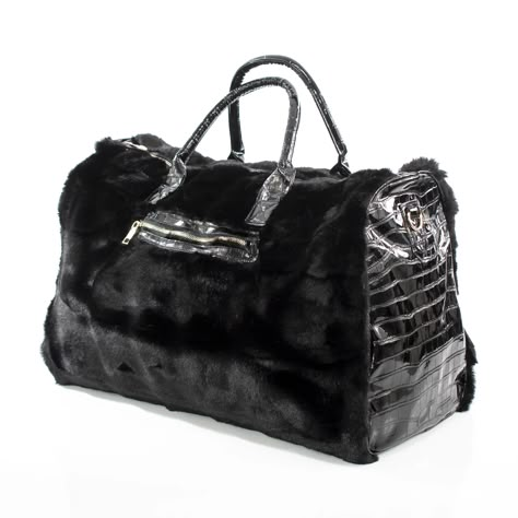 This spacious carrying bag features a fur and leather exterior and designer stylings that make it an impact making addition to any outfit and perfect for either casual or business outings. Product Dimensions (Inches): 21 x 13 x 11 PU Leather and Faux Fur Exterior Polyester Lining Everyday Bag Essentials, Bags Patterns, Fur Handbags, Diy Bags Patterns, Image Swag, Strobe Light, Fur Bag, Buy Bags, Strobe Lights