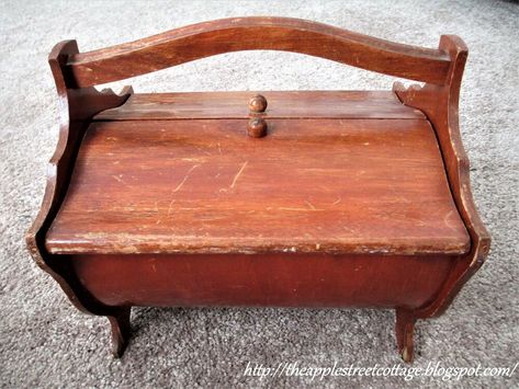 While walking through the local thrift store, I saw this sewing box sitting on a bottom shelf. My grandmother had one just like it and to be honest, I have no idea what happened to it. But here was another one, looking pretty humble.   The finish was worn, the veneer was chipped, and it came home with me.      The first step was to glue all the loose veneer on the legs. I used wood glue and added binder clips to act as clamps...there's a little tip for you!   After the glue was dr… Wooden Sewing Box Ideas, Wooden Sewing Box Upcycle, Vintage Sewing Box Makeover, Sewing Box Makeover, White Painted Dresser, Diy Furniture Painting Ideas, Paint Furniture White, Decoupage Dresser, Removing Baseboards