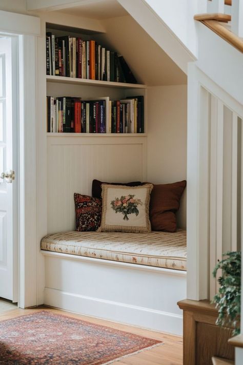 Transform unused nooks and crannies into functional spaces. Turn a corner into a reading nook, a hallway into a home office, or a tiny alcove into extra storage. 📚🛠✨ #SmallSpaceHacks #HomeDecor #CreativeLiving #NookDesign Under Stairs Alcove, Alcove Reading Nook, Alcove Seating Ideas, Under Steps Reading Nook, Under Stair Reading Nook, Alcove Bookshelf, Small Loft Book Nook, Book Nook Under Stairs, Corner Book Shelf With Seat