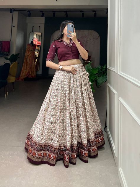 MRD 1223 SINGLES AVAILABLE *Lehenga(Stitched)* Lehenga Fabric : Rayon Cotton Lehenga Work : Patola With Foil Print Waist : Supported up to 42 Stitching : Stitched With Canvas Lehenga closer : Drawstring with tassels Length : 41 Flair : 3.60 Meter Inner : Micro Cotton *Blouse (Stitched)* Blouse Fabric : Pure Cotton Blouse Work : Plain And Handwork With Mirror Work Blouse Size : 38” There Is Margin Customer Can Adjust Upto 44 Blouse Length : 15 Sleeve Length : 12 *Package Contain : Leheng... Lehnga Choli Designer Party Wear, New Model Dress, Lengha Blouse Designs, Mirror Work Dress, Diwali 2024, Print Lehenga, Haldi Outfits, Lehenga Saree Design, Function Dresses