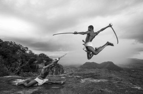 Angampora (Sinhala: අංගම්පොර, Tamil: அங்கம்போர) is a style of martial art native to Sri Lanka and is said to be over 30,000 years old. It is a physical and spiritual training of body and mind in the art form of defense combat, which was almost lost forever during the British Colonization of the Island. Kalaripayattu Photography, Kalaripayattu Art, Acrobatic Poses, Indian Martial Arts, Different Martial Arts, Martial Arts Forms, Male Pose, Best Martial Arts, Martial Arts Techniques