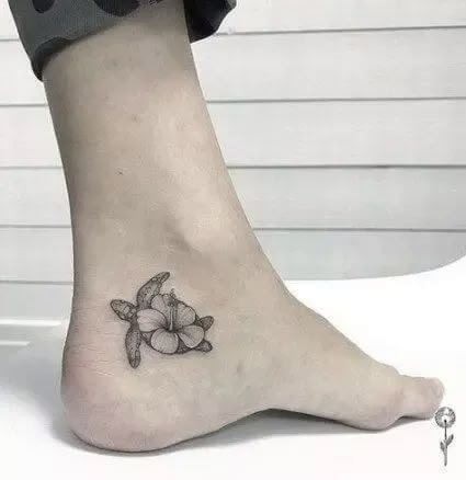 15+ Best Turtle Foot Tattoo Designs | PetPress Rare Tattoos, Turtle Tattoos, Chicago Tattoo, Tattoo Foot, Turtle Tattoo Designs, Small Turtle, Hibiscus Tattoo, Foot Tattoos For Women, Tattoos For Women Flowers