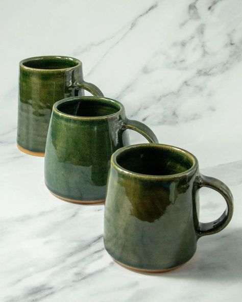 The Glassy Green mug. A semi transparent glaze that shows through a little of the buff stoneware clay's warm toasty speckle. Seeing three sizes lined up like this is very pleasing - and the baby one, the perfect size for a flat white, is just too cute! 💚☕ Green Mug, Green Mugs, Flat White, White Flats, Semi Transparent, Stoneware Clay, Too Cute, Stoneware, Glaze