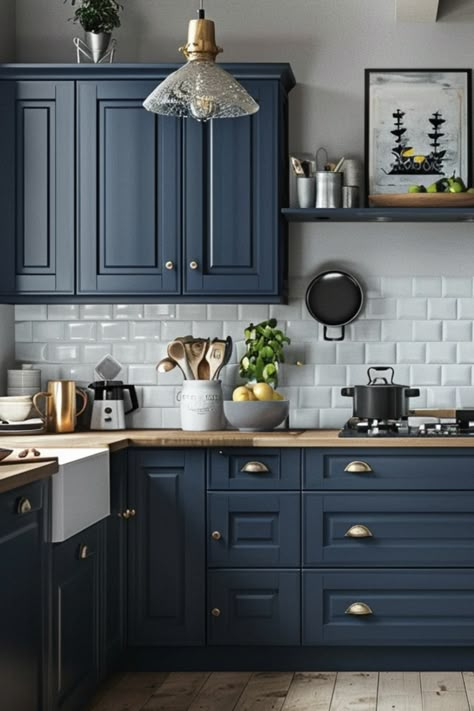 Blue Cabinets With Black Appliances, Navy Cabinets With Granite Countertops, Best Dark Blue For Cabinets, Blue Kitchen Cabinets With Wood Counter, Kitchen Cabinets Painted Blue, Navy Blue Cabinets Butcher Block Counter, Navy Blue Galley Kitchen, Blue Brass Kitchen, Kitchen Backsplash With Navy Cabinets