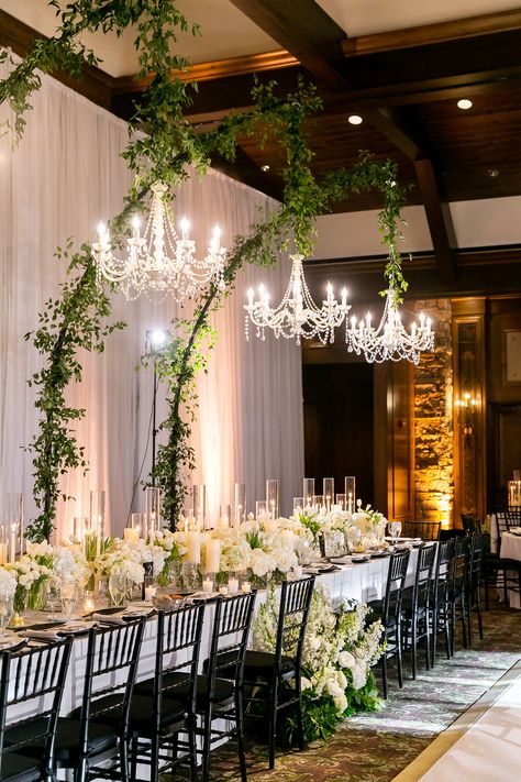 Hanging Chandelier Over Table Wedding, Boho Chandelier Wedding, Greenery On Chandelier Wedding, Crystal Chandelier Wedding Decor, Greenery Hanging From Chandelier, Greenery Chandelier Wedding, Wedding Chandelier Ideas, Chandelier With Greenery, Hanging Chandelier Wedding