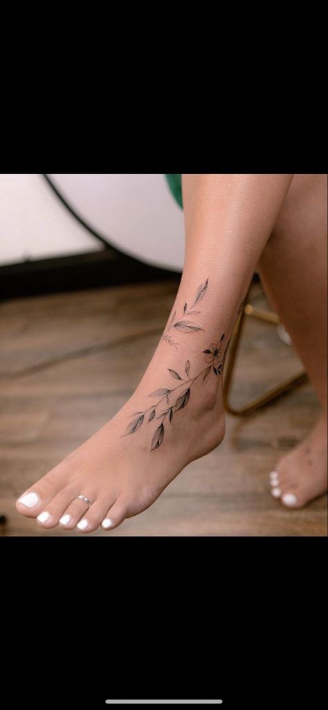 Leaf Vine Ankle Tattoo, Ankle Tattoo Designs Wrap Around, Small Tattoos For Ankle, Ivy Ankle Tattoo, Vine Wrapped Around Ankle Tattoo, Leaves Around Ankle Tattoo, Flower Feet Tattoos For Women, Vine Foot Tattoos For Women, Floral Wrap Around Ankle Tattoo