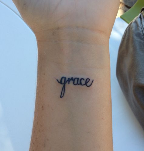 "grace" wrist tattoo Grace Wrist Tattoo, Grace Tattoo, Grace Tattoos, Meaningful Wrist Tattoos, Flower Wrist Tattoos, Tattoo Prices, Wrist Tattoos For Women, Word Tattoos, Foot Tattoos