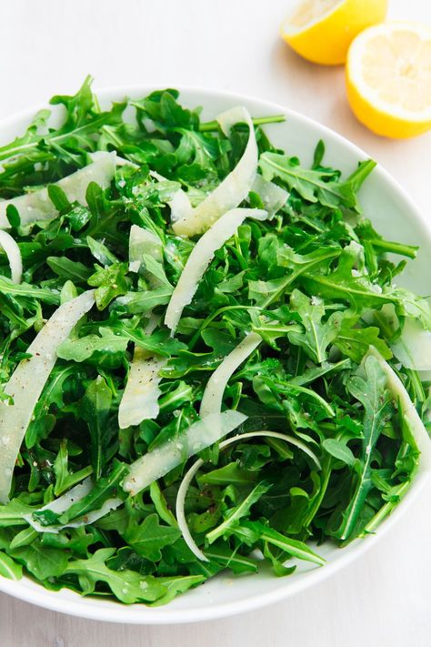 Arugula Salad — Delish.com Easter Dinner Menus, Parmesan Salad, Arugula Recipes, Arugula Salad Recipes, Thanksgiving Salad, Antipasto Salad, Resep Salad, Baked Asparagus, Easter Dinner Recipes