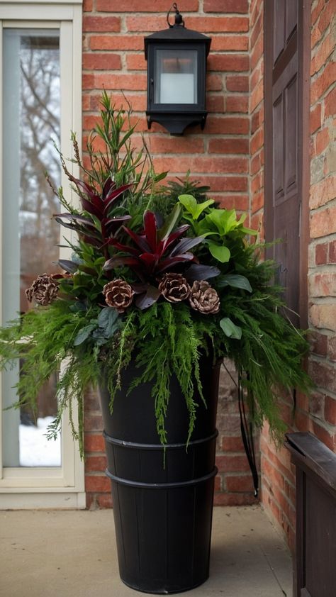 Transform your front porch into a winter wonderland with these DIY outdoor winter planters Learn how to create simple and fake tall Christmas planters using easy pansies birch branches late lanterns and farmhouse style Perfect for adding a touch of festive charm to your outdoor space this season Christmas Greenery Pots Front Porches, Front Porch Planter Ideas Year Round, How To Make A Winter Planter, Winter Potted Plants Front Porches, Front Porch Planters Faux Plants, Outdoor Christmas Planters Winter Porch Front Doors, Winter Front Door Planters, Winter Porch Planter Ideas, Porch Pots Christmas Diy