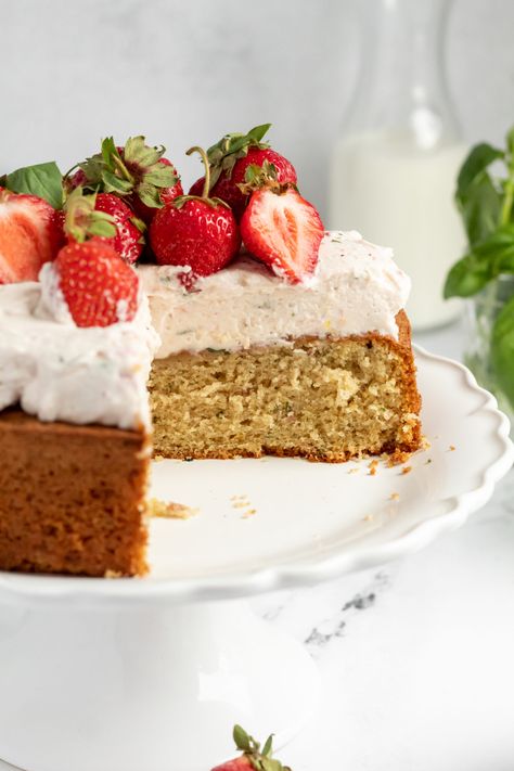 This gorgeous Strawberry Basil Cake makes a super moist, flavorful dessert. This from scratch olive oil cake recipe is flavored with fresh strawberries, basil and lemon zest. It's topped with strawberry basil mascarpone whipped cream and is so delicious! Basil Cake, Cake Pop Flavors, Oil Cake Recipe, Mascarpone Whipped Cream, Baking With Olive Oil, Chocolate Olive Oil Cake, Olive Oil Cake Recipe, Strawberry Basil, Light Cakes