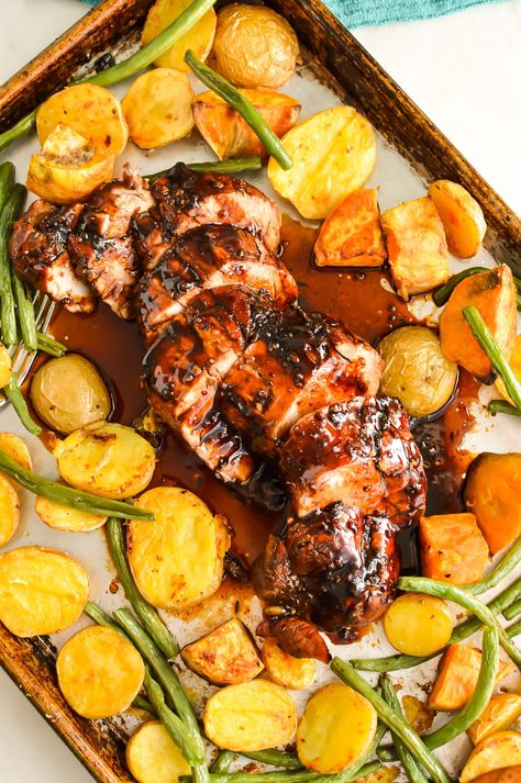 Sheet Pan Pork Tenderloin with sweet balsamic sauce and roasted vegetables like potatoes is the perfect recipe for busy weeknight meals. via @jugglingactmama Sheet Pan Pork Tenderloin With Potatoes, Pork Loin Sheet Pan Dinner, Tenderloin Sheet Pan Dinner, Pork Tenderloin Sheet Pan Dinner, Sheet Pan Pork Tenderloin, Busy Weeknight Meals, Sheet Pan Pork, Easy Pork Tenderloin, Balsamic Sauce