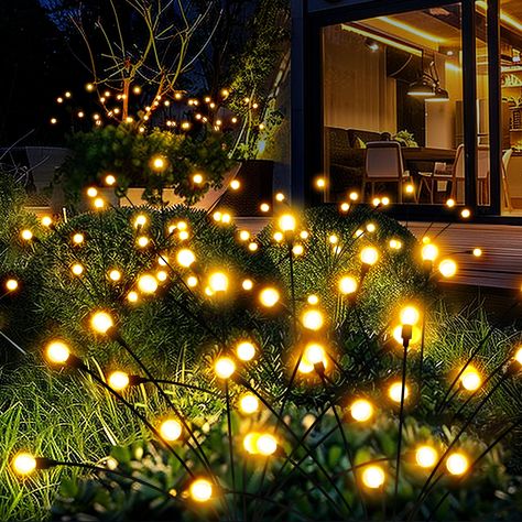 PRICES MAY VARY. Firefly Glow: The warm glow of fireflies dances in the wind on a dark night, PATIOPIA wind dance solar lights creating a unique and beautiful garden scene as Halloween decorations outdoor Energy-saving and easy to install:The LED solar light is powered 100% by solar energy, so customers won't have any trouble with tangled wires and can easily complete the installation High Quality Guarantee:PATIOPIA Solar Garden Decor has IP67 high waterproof performance due to the use of high-q Firefly Garden, Pathway Decoration, Solar Garden Decor, Patio Pathway, Solar Lights Outdoor, Solar Garden Lights, Firefly Lights, Solar Powered Lights, Garden Lights