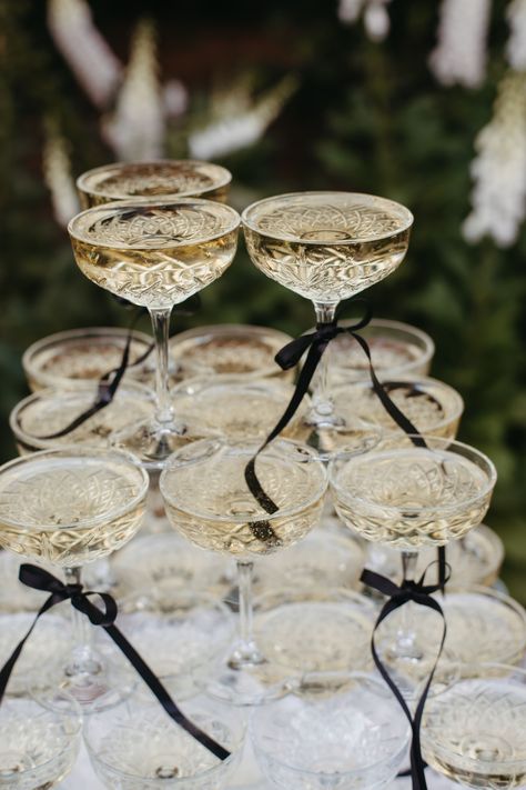 Elevate your garden party with this stunning champagne tower! The perfect centrepiece to add elegance and style to your outdoor celebration. ⁠Cheers to unforgettable moments! Champagne Tower Wedding, Cocktail Hour Decor, Cocktail Party Decor, Outdoor Celebration, Champagne Tower, Champagne Party, Wedding Buffet, Wedding Money, Portugal Wedding