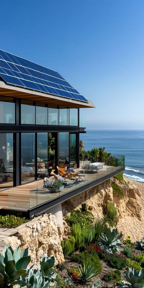 Looking for a modern and sustainable "dream house on the beach?" This cliffside beach house combines solar panels and glass walls for breathtaking ocean views. Explore how to blend eco-conscious living with luxurious design. It's the perfect inspiration for your "modern coastal home aesthetic." Save this pin for innovative architectural ideas! Summer Beach House Aesthetic, Coastal Home Aesthetic, Modern Beach Houses, House On The Beach, Beach House Aesthetic, Summer Beach House, Modern Coastal Home, Cozy Cottages, Architectural Ideas