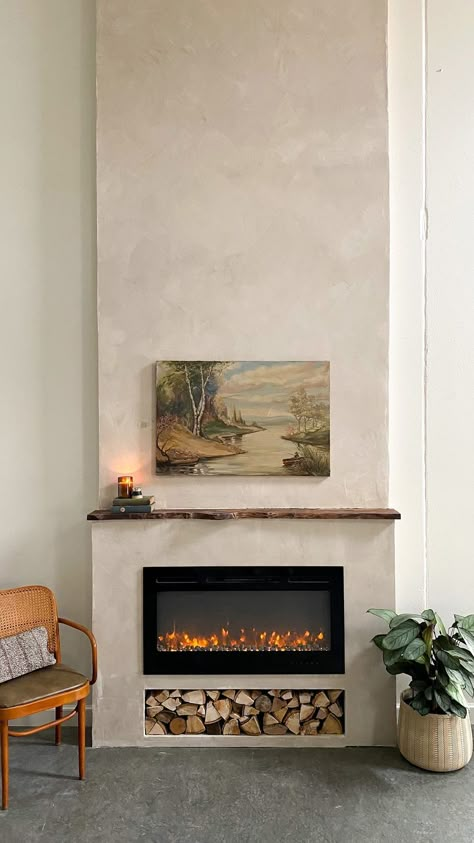 ispydiy on Instagram: I know they say you shouldn’t pick favorites, but this DIY Faux plaster fireplace tops my list! We still have to decorate the living room… Concrete Wash Fireplace, Stone And Stucco Fireplace, Stucco Fireplace Wall, Covering Rock Fireplace, Plaster And Brick Fireplace, Diy Faux Plaster Fireplace, Plaster And Stone Fireplace, Plaster Feature Wall, Organic Fireplace Design