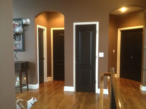 Black doors white trim.....thank u Pinterest for the idea. I luv my house now Black Doors With White Trim, Tan Walls, Black Interior Doors, Design Apartment, Brown Walls, Brown Living Room, Modern Door, Black Doors, Door Ideas