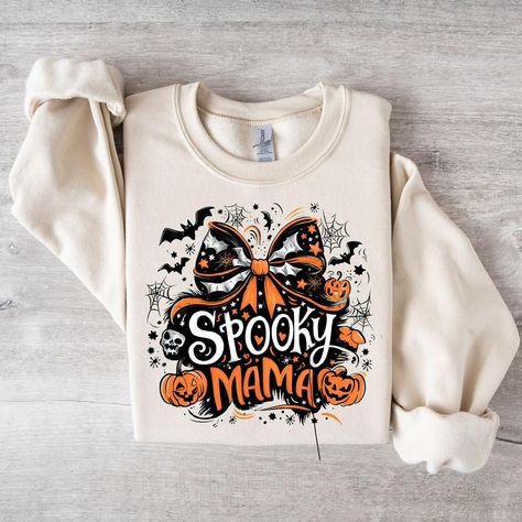 🎃 SPOOKY MAMA HALLOWEEN TEE! 🎃 👻 Available in short & long sleeve and crewneck! 👻 Short sleeve- Gildan:$20 & Comfort Color: $24 Long sleeve- Gildan: $24 & Comfort Color: $32 Crewneck- Gildan: $28 & Comfort Color: $45 ⚡️ XS-5XL sizes available⚡️ 📦We offer local pickup & shipping! ($9 shipping)📦 🖤 Comment below or message us to get yours today! 🖤 #spooky #spookyseason #spooky #mama #spookymama #mom #wear #momwear #halloween #Halloween Comfort Color, Halloween Tees, Crew Neck, Long Sleeve, How To Wear