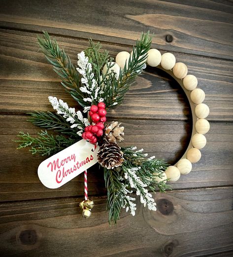 SALE Christmas Home Decor Wood Bead Wreath With Pinecone and | Etsy Space Between Kitchen Cabinets, Bead Wreaths, Mini Wreaths Christmas, Frosted Pinecones, Wood Bead Wreath, Merry Christmas Tag, Senior Crafts, Bead Wreath, Christmas Party Crafts