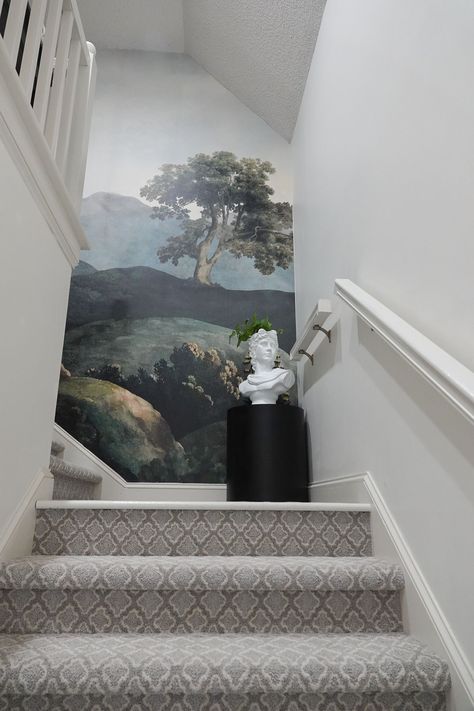 How to Hang a Mural - Sincerely, Sara D. | Home Decor & DIY Projects Wallpaper Stairs Wall, Staircase Mural Wall, Purple Wallpaper Living Room, Top Of Stairs Wall Decor, Shire Decor, Mural Staircase, Staircase Wallpaper Ideas, Wallpaper Stairwell, Stairway Wallpaper