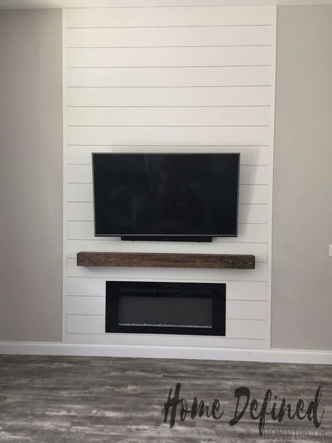 Defining your living room with a farmhouse DIY shiplap accent wall does not have to be costly or difficult. Learn how to make your own faux shiplap from plywood and create an easy and affordable statement wall for any room in your home.    When we first closed on our house, I knew that even though it was newly built, many upgrades needed to be done in order to make it feel like home. We decided that the first room we needed to define was our living room w… Shiplap Tv Accent Wall Without Fireplace, Shiplap Wall Mantle, Flat Wall Fireplace Ideas Shiplap, Shiplap Fireplace Flush With Wall, Interior Siding Ideas, Shiplap Fireplace Tall Wall, Flat Shiplap Fireplace Wall, Mounted Tv On Shiplap Wall, Shiplap Tv Fireplace Wall