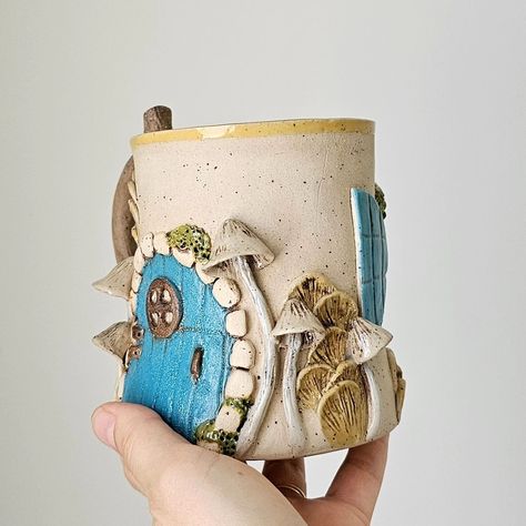 Fairy Door Mug, Hobbit House Mug, Handmade Stoneware Fantastic Mug, Mystical Gifts, One of a Kind Gift, Ceramic Beer Mug, Ceramic Mug #fairydoor #hobbithousemug #hobbithouse #handmadestonewareceramics #uniquegift #ceramicbeermug #ceramicmug #fairyhouse #cottagecore #cottagecoremug #fairymug #mushroommug #hobbitmug #handmadecoffeemug #fairyhousemug Fairy Mug Ceramics, House Mug, Hobbit House, Mug Handmade, Fairy Door, Stoneware Ceramics, Mug Ceramic, Fairy House, The Hobbit