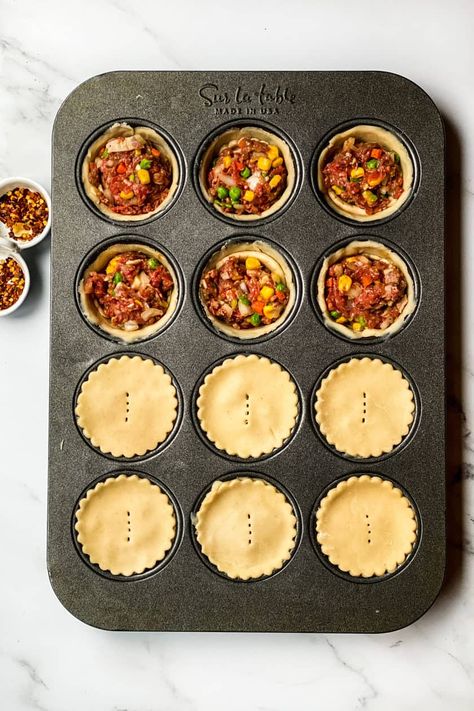 Pub Style Beef Pot Pies in Muffins Tins is a celebration in every bite. Simple to make, utterly delicious, fun to serve, and perfect as an appetizer or the main event. Freezer Baking, Crochet Christmas Ornaments Free Patterns, Diy Crochet Christmas, Mini Pot Pies, Ear Warmer Crochet, Beef Pot Pies, Savoury Pies, Beef Pies, Hand Pie Recipes