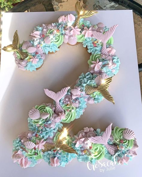 Cre8acake by Julie on Instagram: “Mermaid Themed Pull Apart Cupcakes #mermaid #pullapartcupcakes #pastel #gold #pretty #cakesofinstagram #number2birthday #2 #cre8acakebyjulie” Mermaid Number Cake, Mermaid Cupcake Cake, Mermaid Pool Parties, Pull Apart Cupcake Cake, Pull Apart Cake, Cake Pulls, Mermaid Cupcakes, Mermaid Birthday Cakes, Pull Apart Cupcakes