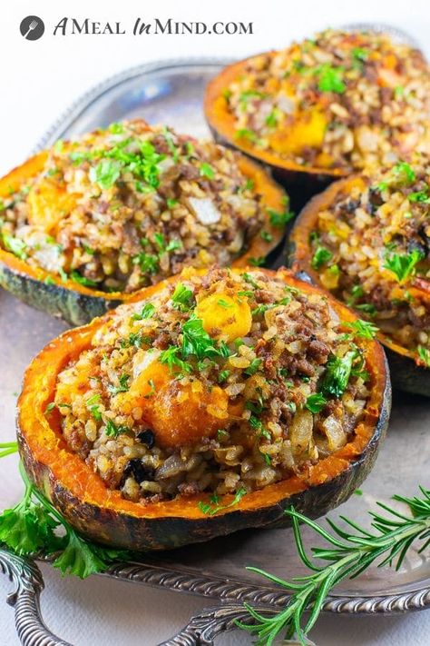 This ground beef-stuffed kabocha squash is a fun shelter-at-home comfort-food recipe. It's a tasty way to dress up ground beef, even for Mother's Day! | A Meal In Mind @amealinmind #amealinmind #stuffedsquash #stuffedkabocha #groundbeef #groundbeefsquash #easyrecipe Ground Beef And Acorn Squash Recipes, Stuffed Acorn Squash Ground Beef, Ground Beef Stuffed Butternut Squash Recipes, Ground Beef Acorn Squash, Ground Chicken Stuffed Acorn Squash, Kabocha Squash Recipe, Chicken Rice Bake, Roasted Kabocha Squash, Buttercup Squash