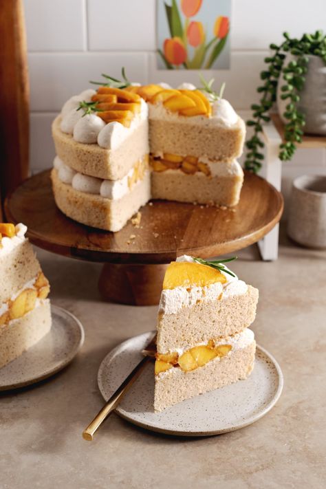 This peaches and cream cake is made with two layers of soft and fluffy chiffon cake with spiced whipped cream and fresh peaches. It's the perfect warm and cozy cake to make during peach season but it works beautifully with canned peaches as well! #peachesandcream #peach #cake #chiffoncake | teakandthyme.com Tiny Cake Recipe, Peaches And Cream Cake, Tiny Cake, Spiced Whipped Cream, Tiny Cakes, Peach Cake, Fresh Peaches, Peaches And Cream, Peach Slices