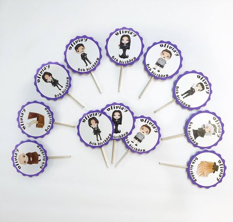 🖤 Add a spooky touch to your party with our custom Addams Family-themed cupcake toppers! Perfect for a hauntingly fun celebration, these toppers bring the iconic family to life—just in time for your next event! 🎃🕸️ ✨ Fully customizable to match your Addams Family party. 🎉 Ideal for birthdays, Halloween, and everything in between. Order yours today and make your cupcakes *mysteriously delicious*! 👻 ************ #AddamsFamilyParty #SpookyCupcakes #CustomPartyDecor #AddamsFamilyVibes #Spook... Addams Family Birthday Party, Addams Family Birthday, Addams Family Mansion, Pokemon Cupcakes, Family Mansion, Family Birthday Party, Mickey Birthday Party, The Addams Family, Mickey Birthday