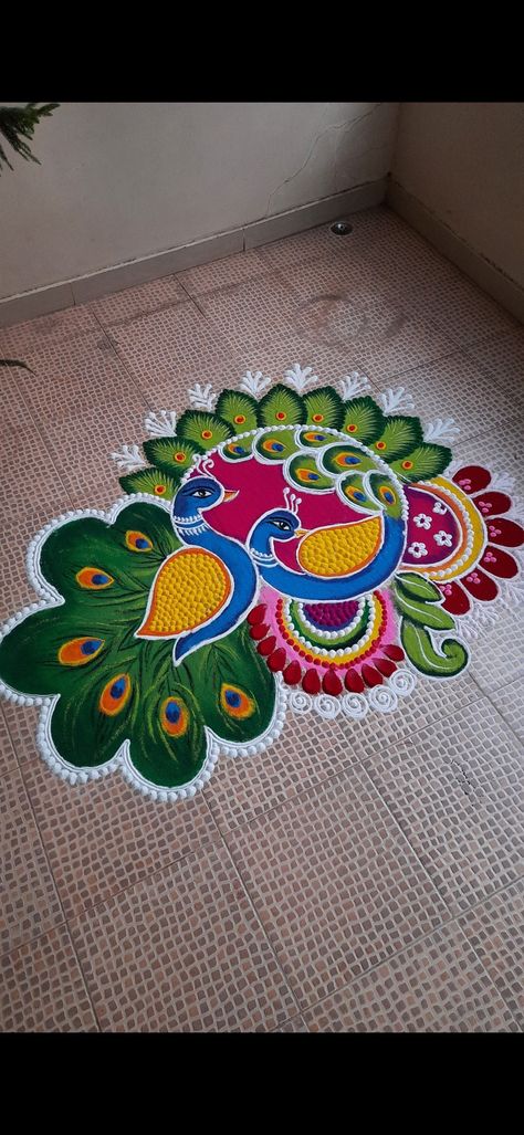 Rangoli Beautiful Designs, Rangoli For Deewali, New Rangoli For Diwali, New Yr Rangoli Designs, Ragoli Color Design Peacock, New Rangoli Designs Peacocks, Unique Rangoli Designs Beautiful Peacock, Rangoli Designs For Diwali Peacock, Trending Rangoli Design For Diwali