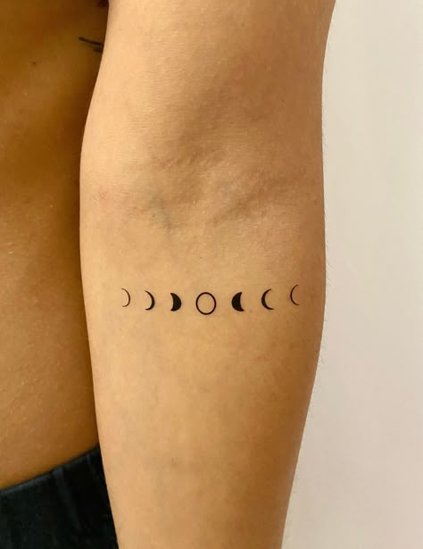 Get these beautiful moon phase temporary tattoos and show your love for the lunar cycle! moonphases tattoos . #Nature_Chest_Piece_Tattoo #Plus_Size_Arm_Tattoo_Placement #Ginko_Leaf_Tattoos_Meaning #Simple_Yin_Yang_Tattoo Behind Ear Tattoo Moon Phases, Fun Tattoos Ideas, Minimalist Tattoo Moon Phases, Moon Phases Tattoo Outline, Moon Phases Circle Tattoo, Moon Phases Tattoo Simple, Vertical Moon Phases Tattoo, Moon Fases Tattoos, Small Moon Phase Tattoo