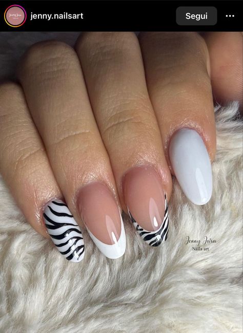 Zebra french nails Zebra Tip Nails Almond, Animal Print Nail Tip Designs, Zebra Print Almond Nails, Almond Zebra Nails, Nail Art Zebra Print, Tiger French Nails, Nails With Zebra Design, Zebra Nails Animal Prints, Zebra Almond Nails