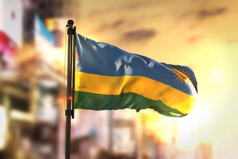 Rwanda flag against city blurred background at sunrise backlight Premium Photo Rwandan Flag, Rwanda Flag, Yellow Business Card, Blue Business Card, Waves Logo, Abstract Paper, Waves Background, Abstract Waves, Abstract Logo