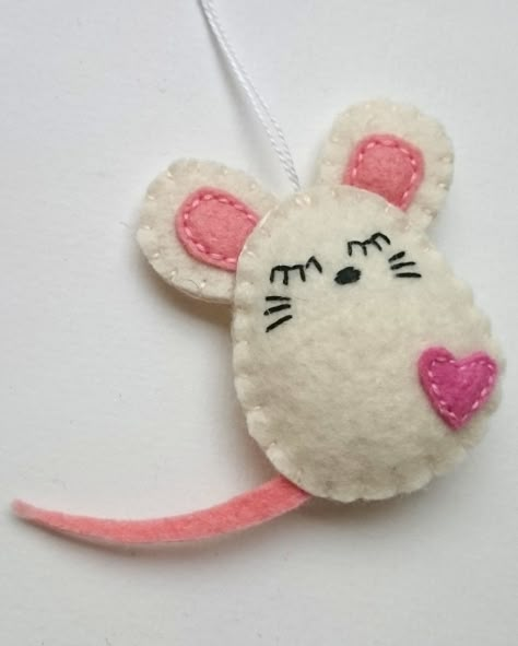 🐭🎄 Adorable Felt Mouse Ornaments - Ready to Ship! 🎄🐭 Bring a sprinkle of cuteness to your holiday decor with my charming Felt Mouse Ornaments, available now in my shop! These little mice are crafted with love and attention to detail, making them the perfect addition to your festive decorations. 🎁 Perfect Gift: Ideal for mouse lovers and anyone who appreciates handcrafted ornaments, these felt mice make thoughtful and unique gifts. 🌟 Handmade Quality: Each ornament is made from high-quality... Unique Felt Crafts, Felt Mouse Pattern Free, Disney Felt Ornaments, Felt Ballerina, Felt Patterns Free, Kawaii Felt, Mouse Ornaments, Easy Felt Crafts, Felt Mice