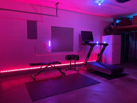 A little bit of lightning goes a long way in a garage. Sweating in neon lights is a little more fun. Gym With Neon Lights, Home Gym Neon Lights, Apartment Neon Lights, Led Lights Gym Room, Gym With Led Lights, Home Spin Studio, Garage Gym Led Lights, Workout Room Lighting, Garage Gym Lighting Ideas