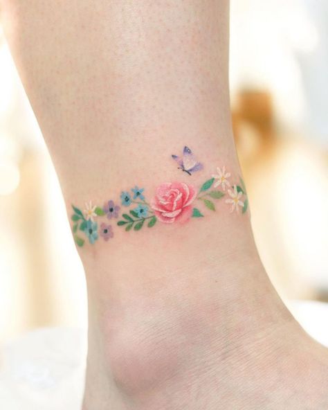 Small Flowers Tatoo by Saegeem | Best Tattoo Ideas Gallery Tattoo Around Ankle, Delicate Tatoos, Daschund Tattoo, Anklet Tattoos For Women, Wrap Around Wrist Tattoos, Leg Sleeve Tattoos, Delicate Tattoos For Women, Leg Tattoo Ideas, Flowers Tattoos