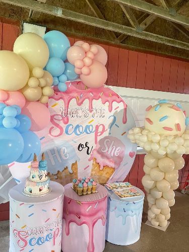 We created this giant ice cream cone made out of balloons and the balloon garland attached to the backdrop! Turned out adorable and was the perfect addition to this gender reveal party. Pop the ice cream cone to reveal the gender! Contact us for event design, balloons, and more! Ice Cream Gender Reveal Centerpieces, Gender Reveal Ideas Ice Cream Theme, Candy Themed Gender Reveal, I’ve Cream Gender Reveal, What’s The Scoop Gender Reveal Party Favors, What’s The Scoop Gender Reveal Party, Ice Cream Themed Gender Reveal Party, Gender Reveal Ice Cream Theme, What’s The Scoop