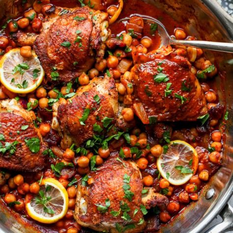 One Pan Moroccan Chicken and Chickpeas - Dishing Out Health Roasted Pistachios Recipe, Chicken Chickpeas, Moroccan Chicken Recipe, Dishing Out Health, Roasted Pistachios, Garlic Yogurt, Cucumber Avocado Salad, Moroccan Chicken, Chicken With Olives