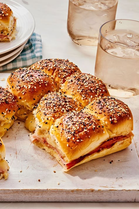 Classic Ham Delights are the most-searched appetizer in the South, and for good reason. These mini and melty ham sandwiches are super satisfying and easy to eat, which is what everyone wants in an appetizer. Plus, they're a host’s dream—they aren’t fussy to make but look impressive. #hamandcheesesliders #minihamandcheese #minisandwiches #appetizers #classicrecipes Ham Party Sandwiches, Fancy Ham Sandwiches, Leftover Ham Appetizers, Ham Appetizers For Party, Ham Delights Recipe, Sandwich Appetizers, Ham Appetizers, Ham Delights, Ic Recipes