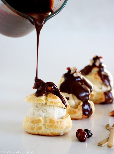 These Profiteroles are a classic French dessert. Made with an easy choux pastry and served with warm chocolate sauce and candied hazelnuts, these are perfect for the holidays!  #sharing #dessert #Winter #Christmas #madefromscratch Chocolate Profiteroles, French Breakfast Recipes, Chocolate Eclair Recipe, Chocolate Brioche, Bakery Chocolate Chip Cookies, French Dessert Recipes, Classic French Desserts, Eclair Recipe, Profiterole