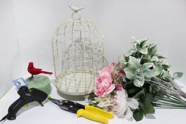 DIY Decorative Floral Bird Cage | eHow Flower Arrangements Diy Artificial, Decorative Bird Cages, Decorating Wreaths, Diy Umbrella, Umbrella Wreath, Diy Bird Cage, Bird Cage Centerpiece, Floral Umbrellas, Bird Cage Decor